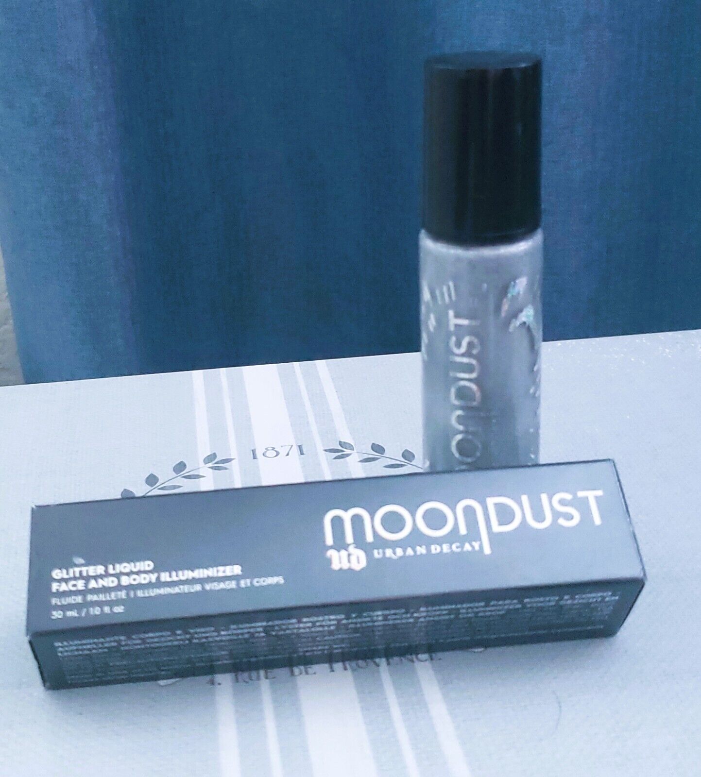 UD Moondust Glitter Liquid Face & Body Illuminizer - Moonspoon